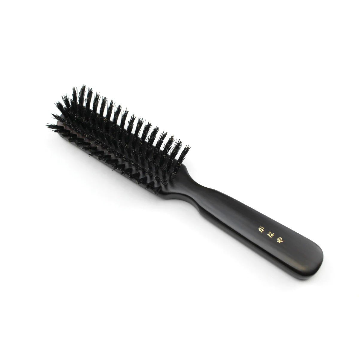 Angled side view of a Kanaya natural bristle hair brush in medium firmness, featuring black bristles and a dark wooden handle with gold Japanese characters. Ideal for smoothing and styling with gentle tension.