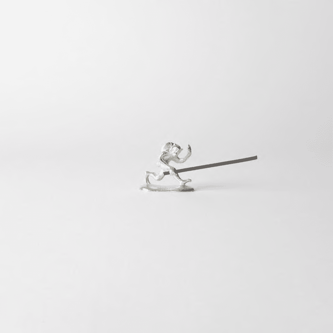 Chōjū-giga monkey incense holder holding incense stick, capturing the dynamic motion of the leaping monkey from Japan’s famous animal caricature scrolls.