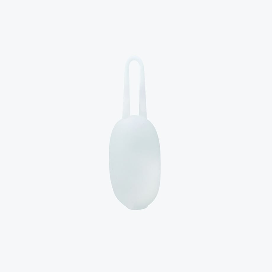 Minimalist white Cocoon Eco Bag case with soft matte finish and built-in loop handle for easy portability. The compact oval design stores a full-sized eco bag inside, perfect for daily shopping or travel.