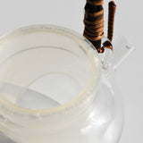 Close-up of glass kyusu teapot with fine mesh infuser and rattan handle, 250ml Japanese loose leaf tea pot.