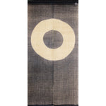 Janome noren curtain with concentric circle motif in natural and charcoal tones, traditional Japanese doorway hanging.