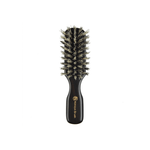 A compact travel-sized natural bristle hairbrush from Kanaya Brush with a dark wooden handle engraved in gold. The soft boar bristles are densely packed in a rounded rectangular shape, designed to gently detangle hair, add shine, and distribute natural oils while on the go. Ideal for maintaining hair health during travel.