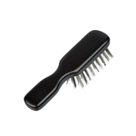 Angled back view of the Kanaya travel hairbrush showing its smooth, dark wooden handle and natural bristles. A compact, elegant brush ideal for travel or daily touch-ups.