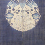 Close-up of Shochikubai noren curtain in indigo featuring pine, bamboo, and plum crest motif, traditional Japanese fabric panel.