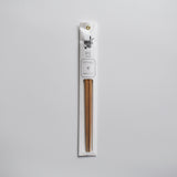 Single pack of Tetoca wooden chopsticks in the Kuri Chestnut wood variant, displayed in original Japanese packaging on a light background.
