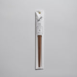Minimalist packaged chopsticks made from Japanese ume (plum) wood with a delicate floral label design